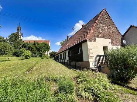 Gartenansicht m. Kirche - Einfamilienhaus in 67814 Jakobsweiler mit 150m² kaufen