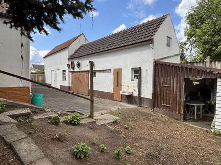 Nebengebäude und Garage Nebengebäude und Garage - Einfamilienhaus in 67574 Osthofen mit 169m² kaufen