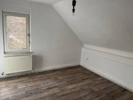 Neu im Angebot! Stadtzentrum - Mehrfamilienhaus mit kleinem Ladengeschäft 