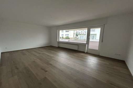 Wohnzimmer  - Mehrfamilienhaus in 55546 Hackenheim mit 281m² als Kapitalanlage kaufen