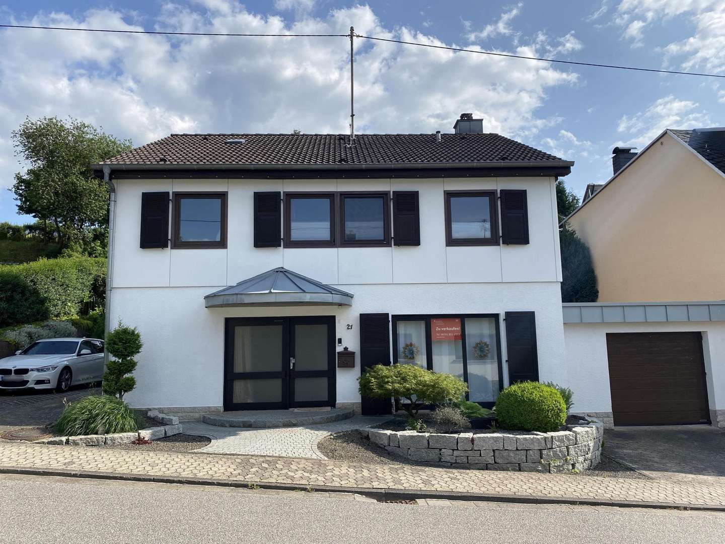 Ansicht Straßenseite - Einfamilienhaus in 55494 Rheinböllen mit 162m² kaufen