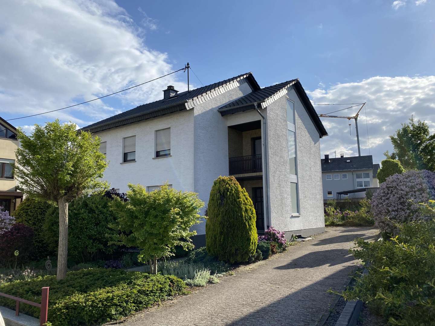 Ansicht Haus Straßenseite - Einfamilienhaus in 55494 Rheinböllen mit 145m² kaufen