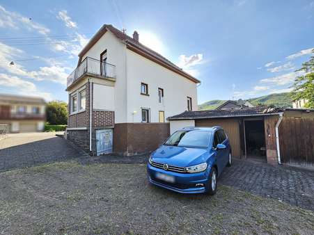 Außenansicht Außenansicht - Einfamilienhaus in 55743 Idar-Oberstein mit 100m² kaufen