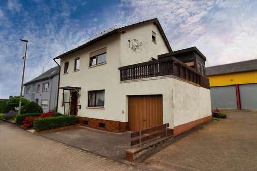 Ansicht seitlich rechts Ansicht seitlich rechts - Einfamilienhaus in 55608 Bergen mit 100m² kaufen