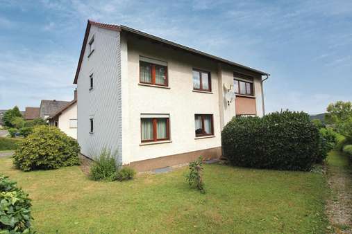 Außenansicht Außenansicht - Zweifamilienhaus in 55765 Schmißberg mit 177m² kaufen