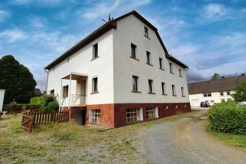 Außenansicht Außenansicht - Zweifamilienhaus in 55767 Wilzenberg-Hußweiler mit 160m² kaufen