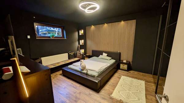 Schlafzimmer Schlafzimmer - Souterrain-Wohnung in 56218 Mülheim-Kärlich mit 96m² kaufen