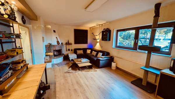 Wohnzimmer Wohnzimmer - Souterrain-Wohnung in 56218 Mülheim-Kärlich mit 96m² kaufen