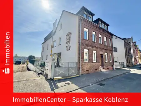 Großzügige Wohnung auf zwei Etagen mit Balkon und Garage in ansprechender Lage!