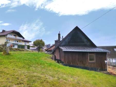 Gartenansicht Gartenansicht - Einfamilienhaus in 56477 Rennerod mit 77m² kaufen