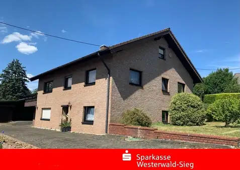 Einziehen und wohlfühlen - Großzügiges Einfamilienhaus mit angrenzendem Grundstück 
