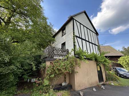Straßenansicht Straßenansicht - Einfamilienhaus in 57587 Birken-Honigsessen mit 120m² kaufen