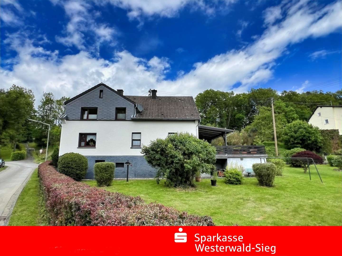 Seitenansicht Seitenansicht - Zweifamilienhaus in 57610 Almersbach mit 165m² kaufen