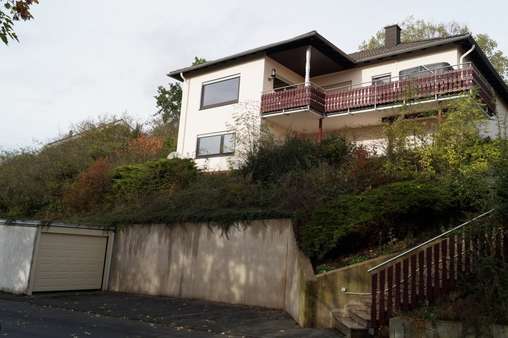 Straßenansicht mit Garage - Einfamilienhaus in 53545 Ockenfels mit 167m² kaufen