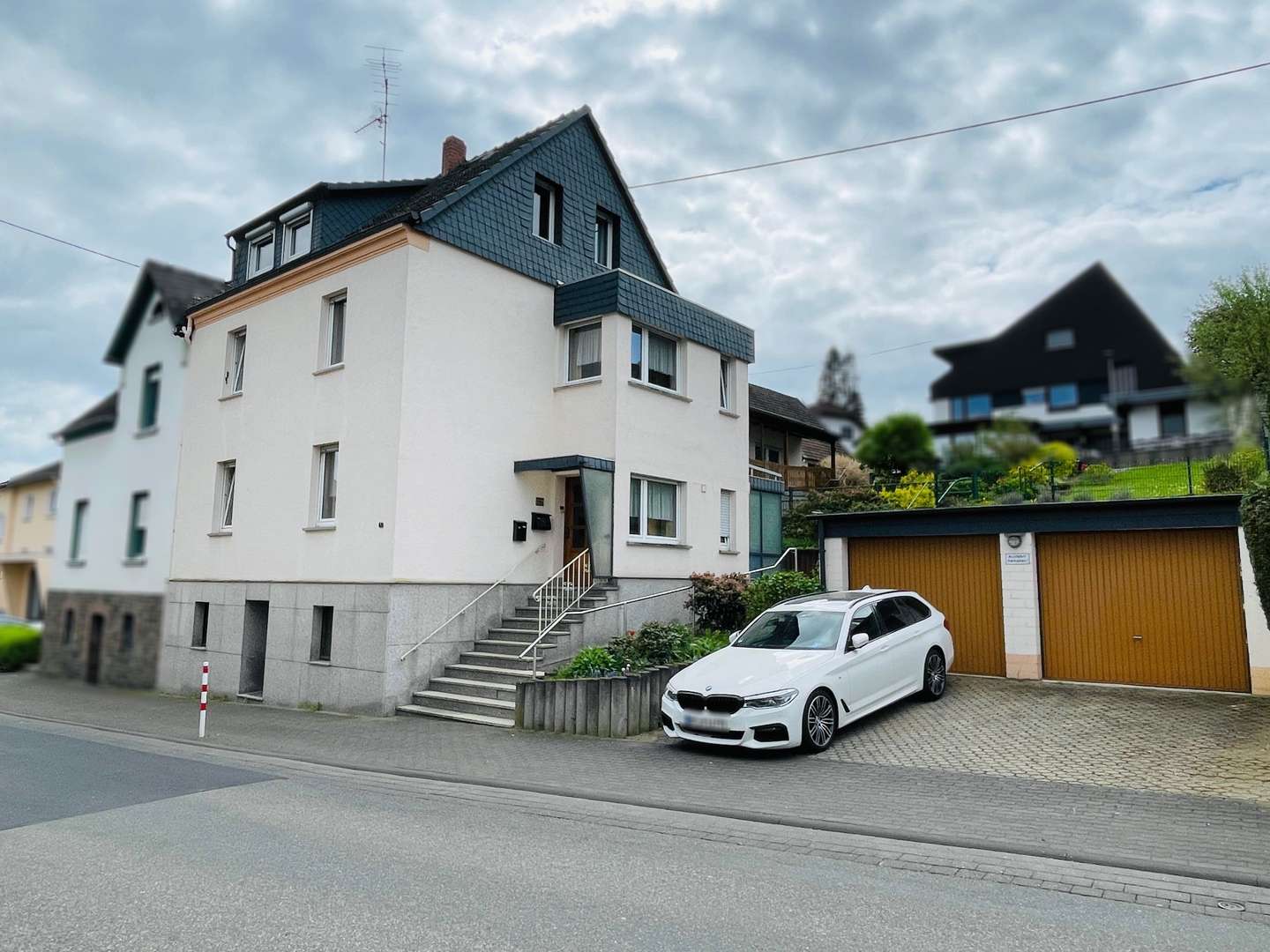 Straßenansicht - Einfamilienhaus in 56567 Neuwied mit 191m² kaufen