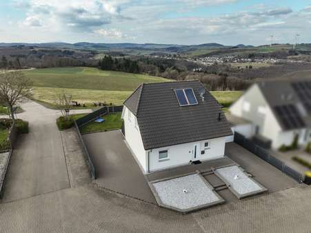 Drohnenaufnahme - Einfamilienhaus in 56729 Kirchwald mit 120m² kaufen