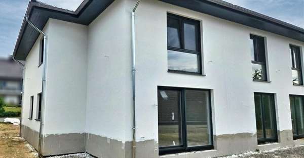 Doppelhaushälfte in 56759 Laubach mit 125m² kaufen