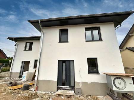 Doppelhaushälfte in 56759 Laubach mit 125m² kaufen