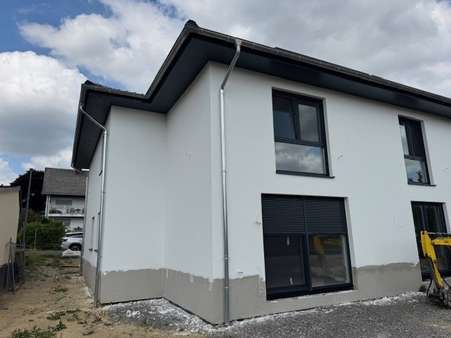 Doppelhaushälfte in 56759 Laubach mit 125m² kaufen