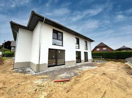 Doppelhaushälfte in 56759 Laubach mit 125m² kaufen
