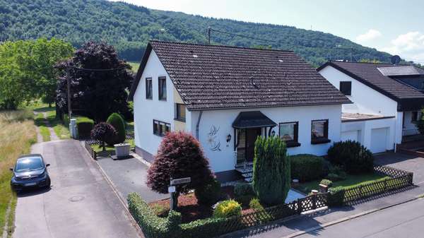 Ansicht Seite Ansicht Seite - Einfamilienhaus in 54441 Schoden mit 130m² kaufen
