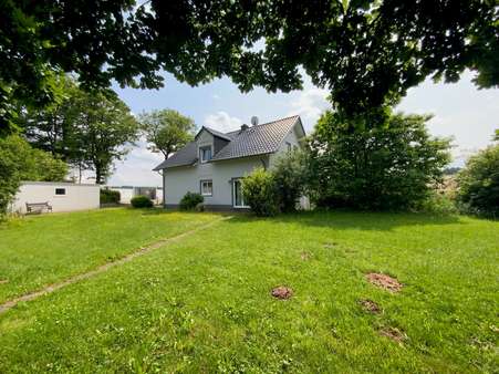 Rückansicht Rückansicht - Mehrfamilienhaus in 54597 Neuheilenbach mit 168m² kaufen
