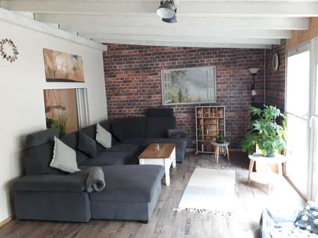 Wohnzimmer EG Ferienhaus Wohnzimmer EG Ferienhaus - Zweifamilienhaus in 54578 Oberehe-Stroheich mit 220m² kaufen