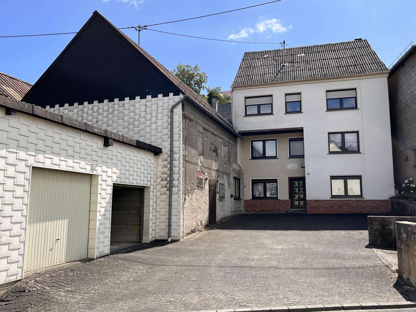 Ansicht Straßenseite - Einfamilienhaus in 56769 Arbach mit 156m² kaufen
