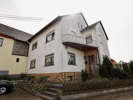 Frontansicht Wohnhaus - Einfamilienhaus in 56858 Mittelstrimmig mit 136m² kaufen