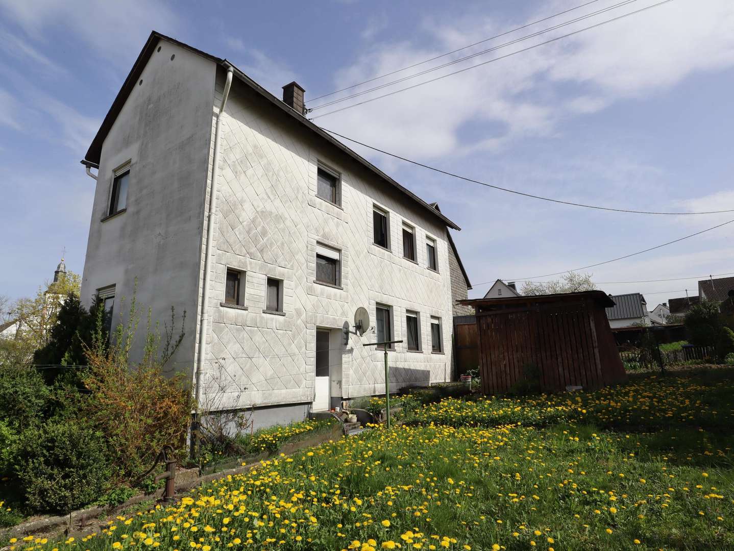 Rückansicht Wohnhaus - Einfamilienhaus in 56858 Mittelstrimmig mit 136m² kaufen