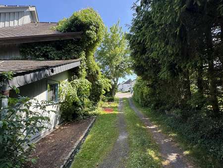 Hauszufahrt Hauszufahrt - Einfamilienhaus in 54472 Monzelfeld mit 144m² kaufen