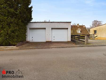 Außenansicht Garage - Einfamilienhaus in 66125 Saarbrücken mit 120m² kaufen