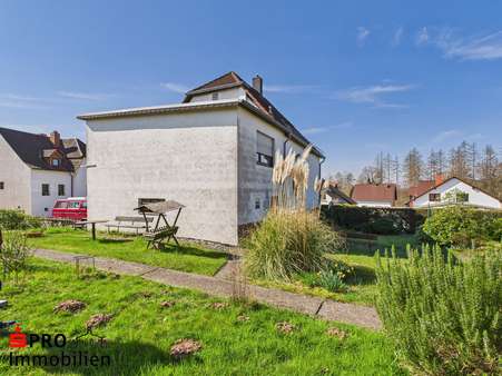 Seitenansicht - Einfamilienhaus in 66265 Heusweiler mit 139m² kaufen