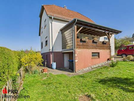 Seitenansicht - Einfamilienhaus in 66265 Heusweiler mit 139m² kaufen
