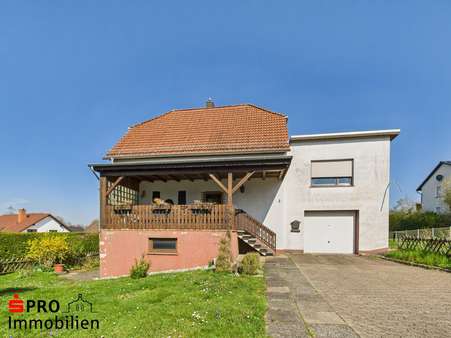 Vorderansicht - Einfamilienhaus in 66265 Heusweiler mit 139m² kaufen