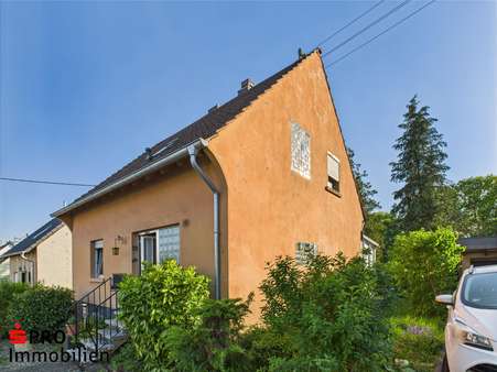 Seitenansicht - Einfamilienhaus in 66126 Saarbrücken mit 120m² kaufen