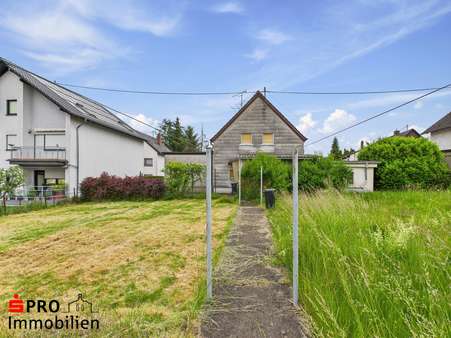 Rückansicht + Garten - Einfamilienhaus in 66333 Völklingen mit 135m² kaufen