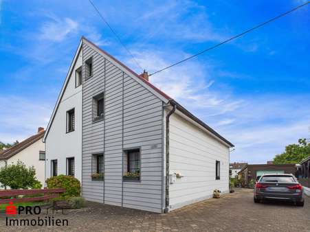 Frontansicht - Einfamilienhaus in 66128 Saarbrücken mit 88m² kaufen