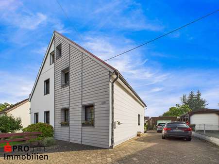 Frontansicht - Einfamilienhaus in 66128 Saarbrücken mit 88m² kaufen