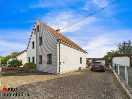 Seitenansicht - Einfamilienhaus in 66128 Saarbrücken mit 88m² kaufen