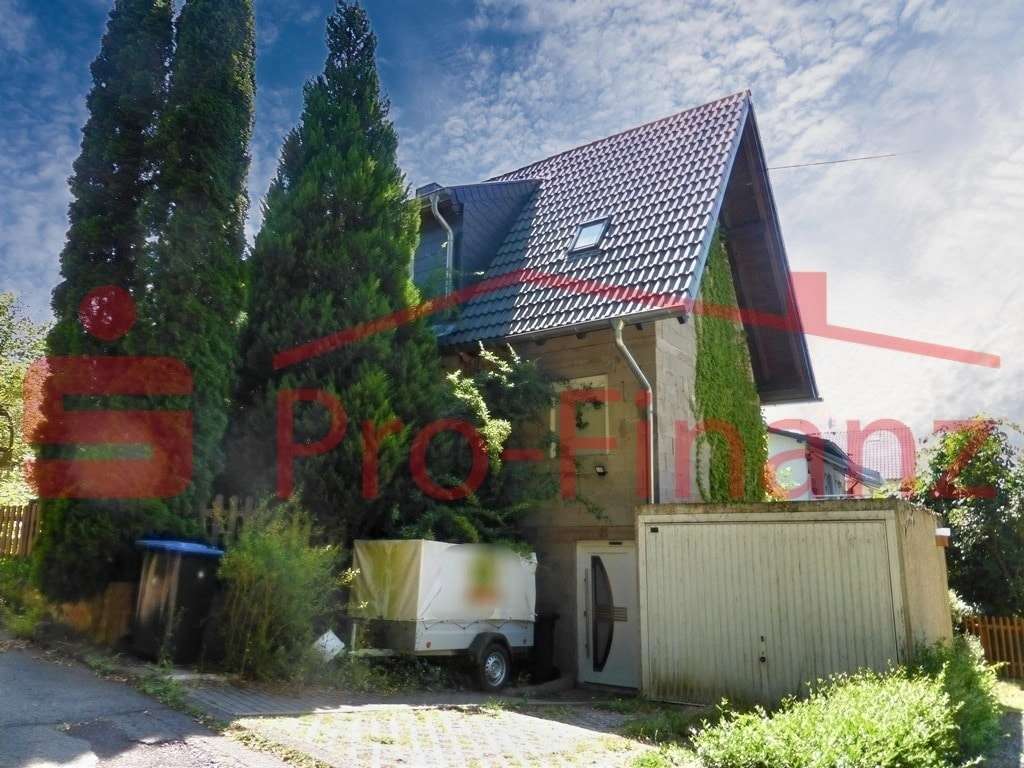 Vorderansicht - Einfamilienhaus in 66265 Heusweiler mit 103m² kaufen