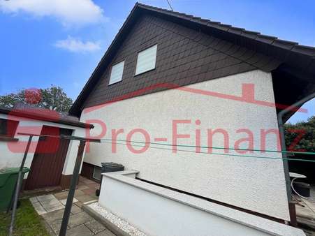 Seitenansicht - Einfamilienhaus in 66127 Saarbrücken mit 113m² kaufen