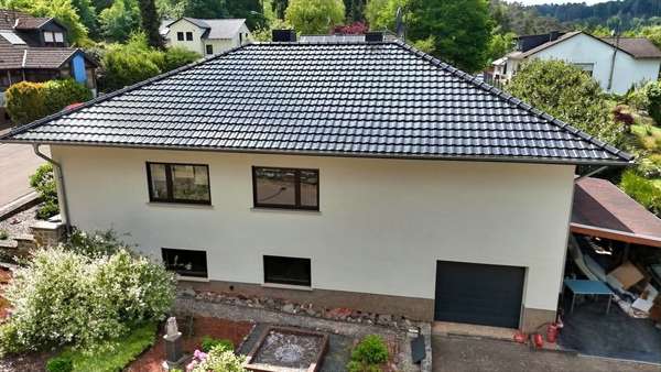Seitenansicht - Einfamilienhaus in 66693 Mettlach mit 148m² kaufen