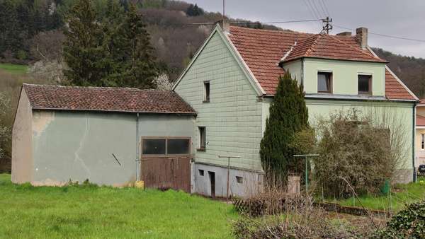 Front links - Einfamilienhaus in 66663 Merzig mit 140m² kaufen