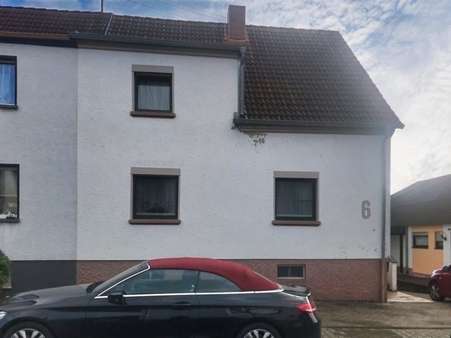 Strassenansicht - Einfamilienhaus in 66450 Bexbach mit 145m² kaufen