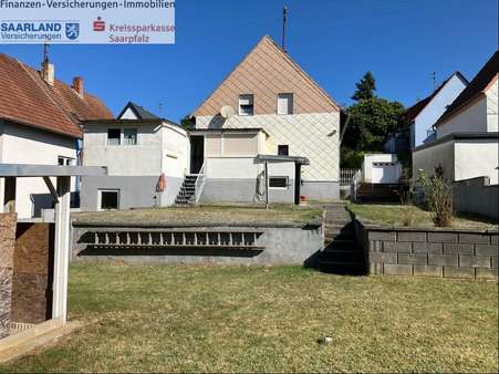 Rückansicht Rückansicht - Einfamilienhaus in 66450 Bexbach mit 115m² kaufen