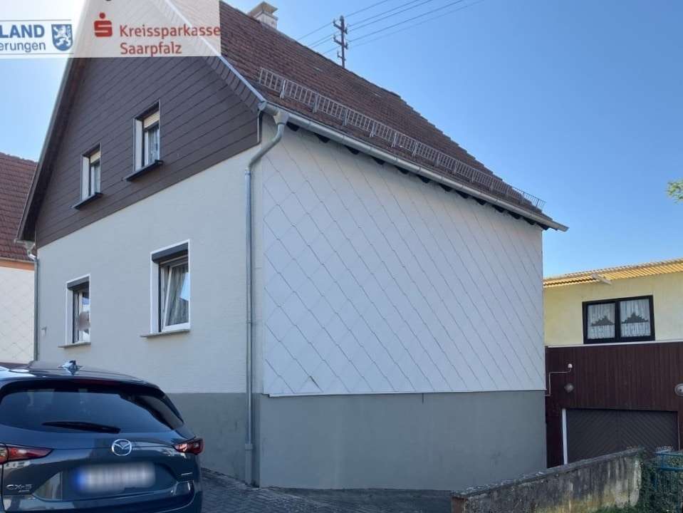 Strassenansicht Strassenansicht - Einfamilienhaus in 66450 Bexbach mit 115m² kaufen