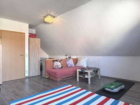 Wohnzimmer Wohnzimmer - Dachgeschosswohnung in 71106 Magstadt mit 60m² kaufen