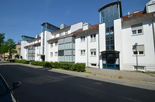 Vermietete 2 Zimmerwohnung mit Gartenanteil und TG-Stellplatz