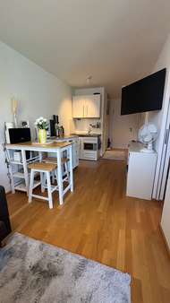 Wohnzimmer mit Blick Richtung Wohnungseingangstüre - Erdgeschosswohnung in 71679 Asperg mit 28m² kaufen